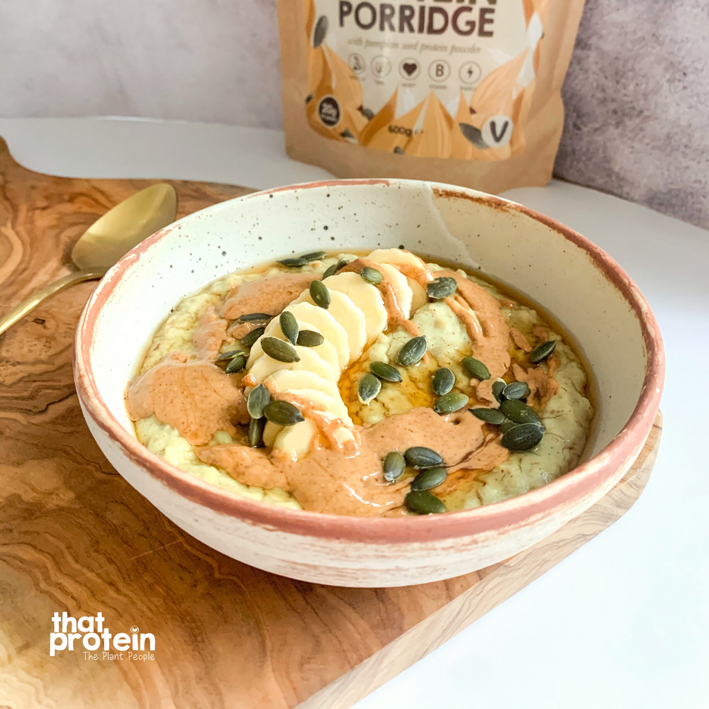 
                  
                    Load image into Gallery viewer, that protein perfectly pure high protein porridge served its a bowl of care my high protein oats with banana and pumpkin seeds
                  
                